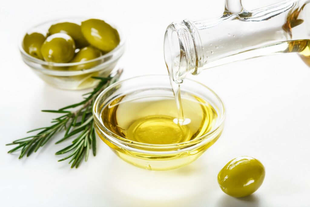 olive oil - 9 Best Natural Remedies For Dark Spots On Face - by livelovelaugh